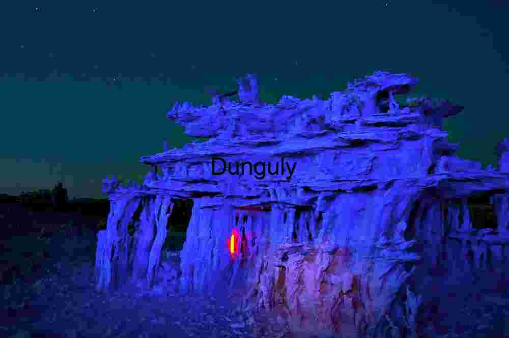 Electric Night Glow on Desert Rock Formations