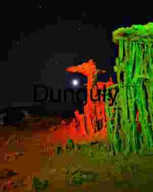 Moonlit Desert Formations with Red and Green Illumination