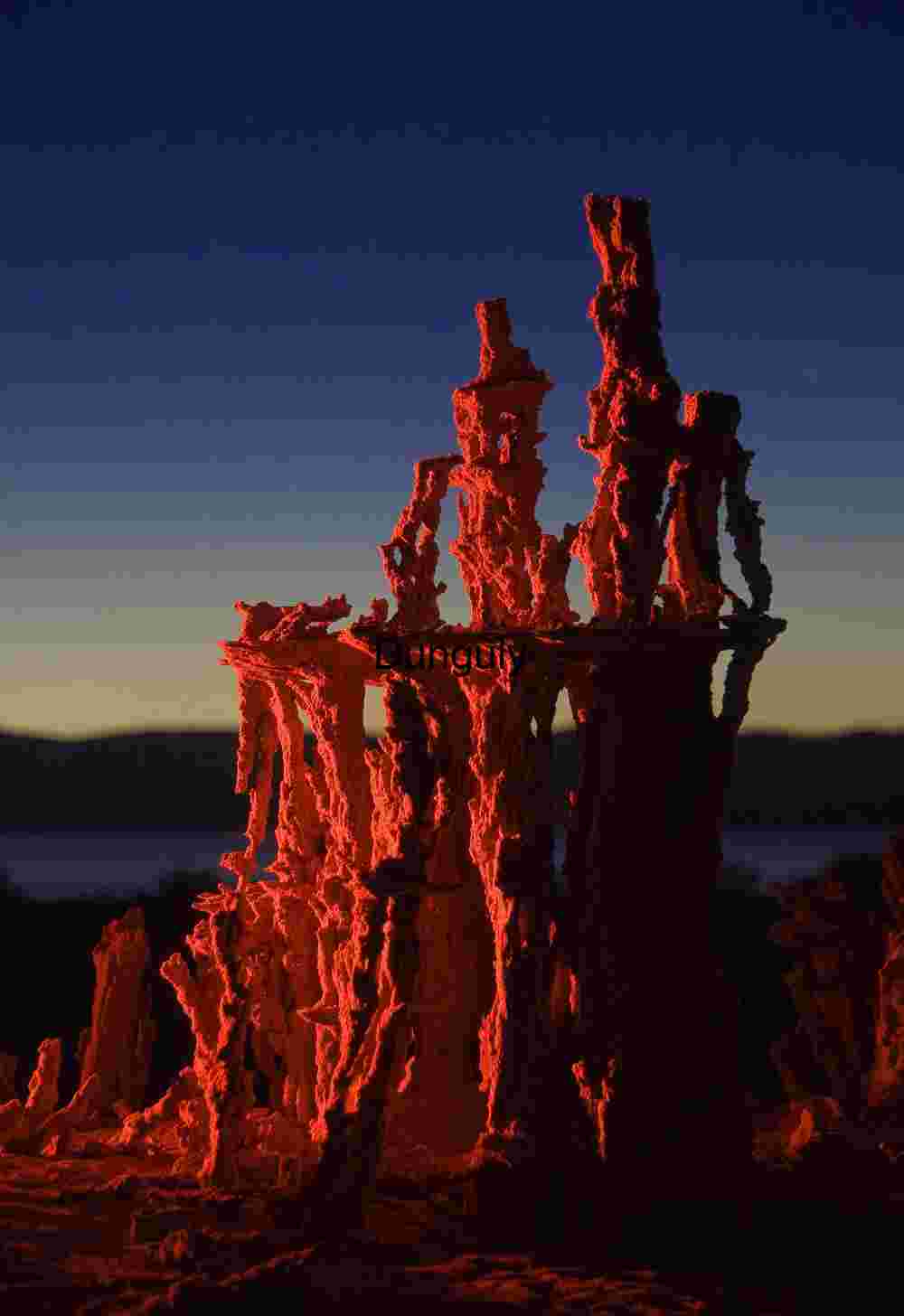 Red‑Lit Tufa Tower at Mono Lake Twilight