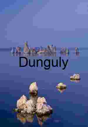 Reflections in Still Water: Tufa Towers Beneath a Soft Sky