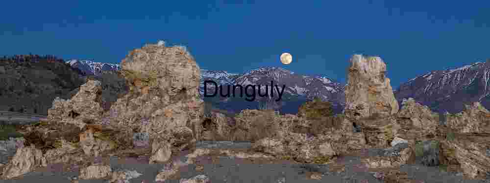 Moonlit Tufa Landscape Framed by Snowy Sierra Peaks