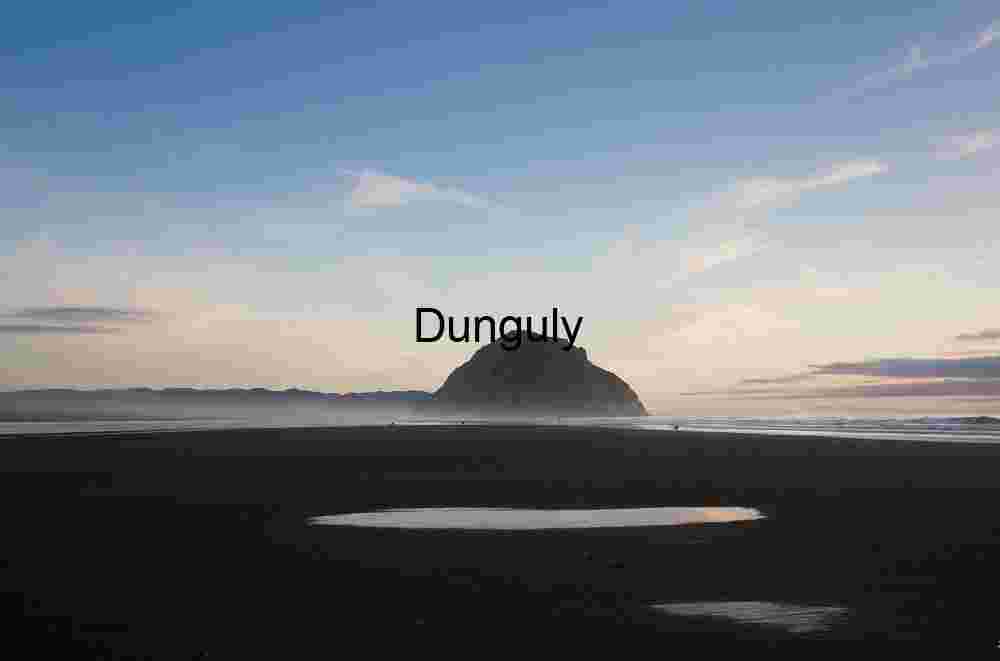 Morro Rock at Dusk: Coastal Serenity and Reflected Skies