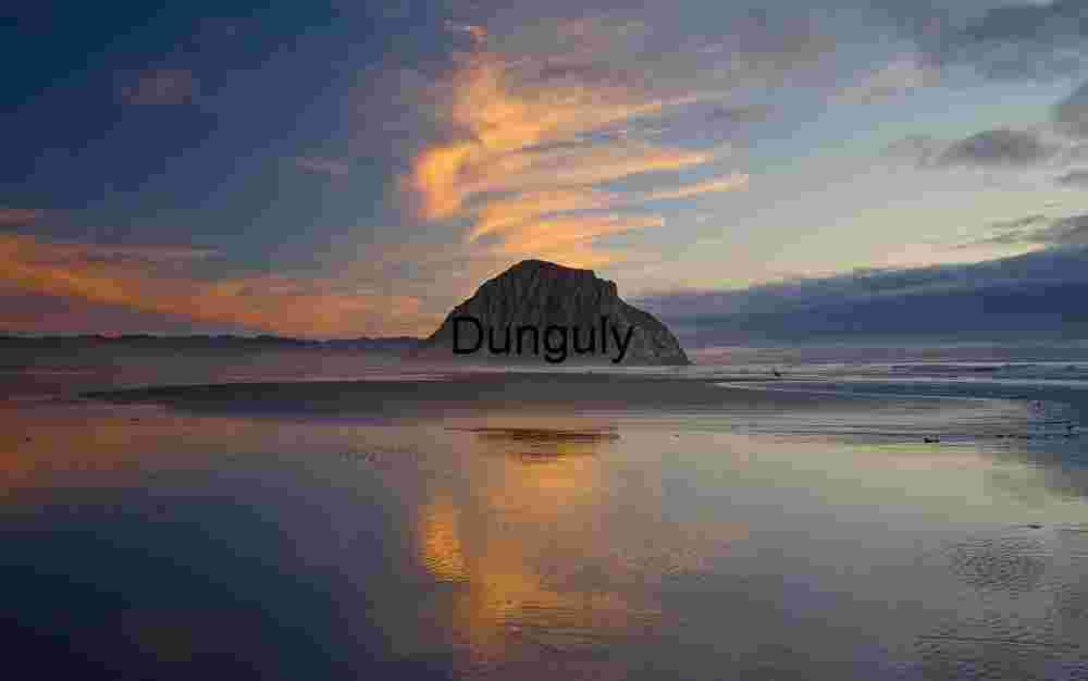 Sunset Reflections at Morro Rock: Coastal Elegance and Geological Majesty