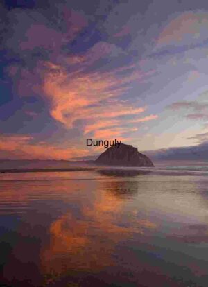 Monolithic Grace: Coastal Sunrise Reflections and Atmospheric Drama