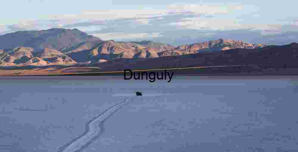 Moody Desert Landscape Featuring Mysterious Tire Track Patterns