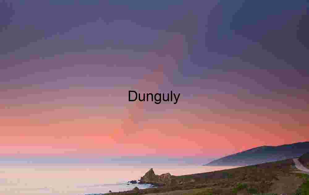 Radiant Horizon: Coastal Light Beam and Sunset Over Rugged Shores