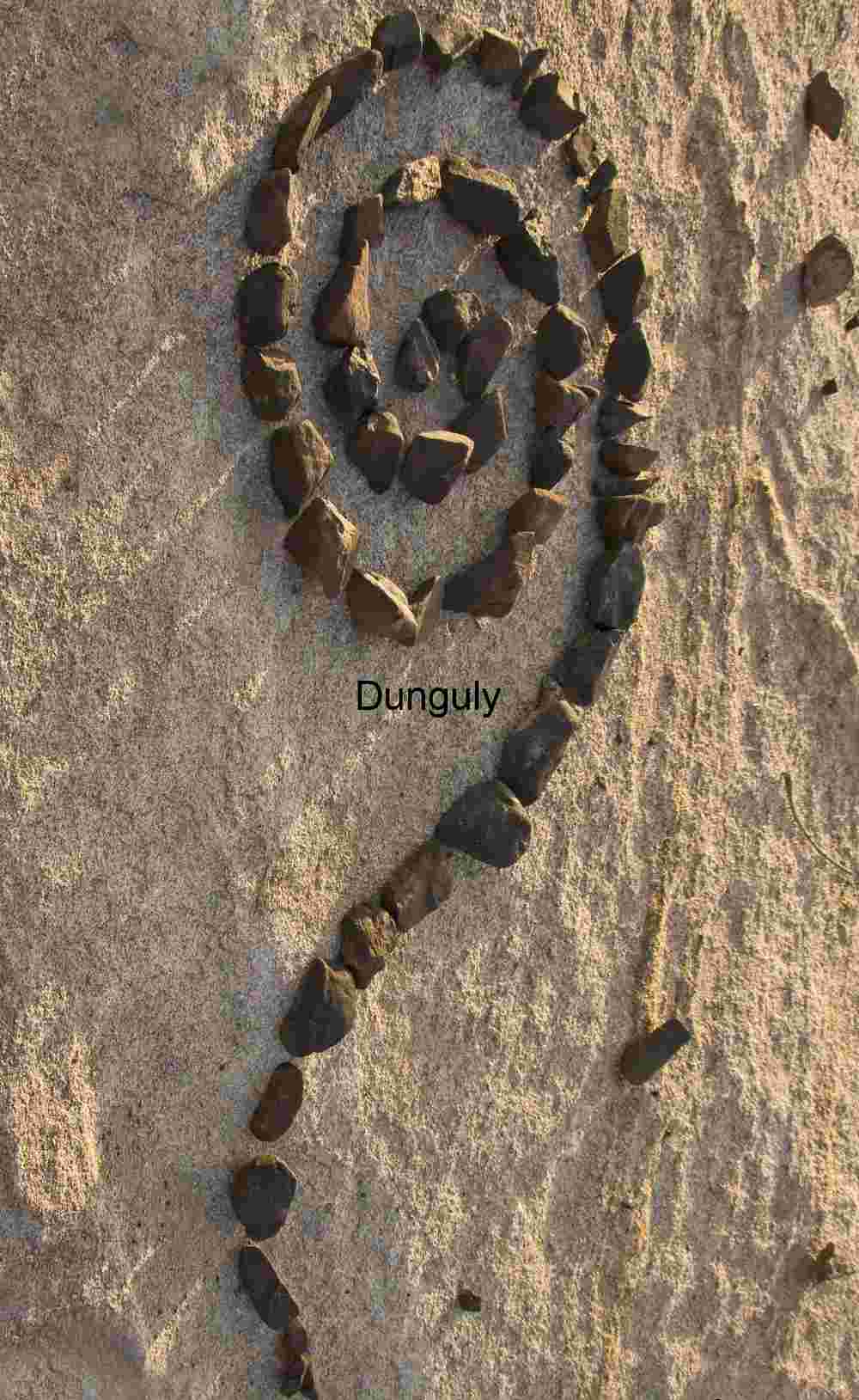 Spiral Drift: Stone Geometry on Desert Canvas
