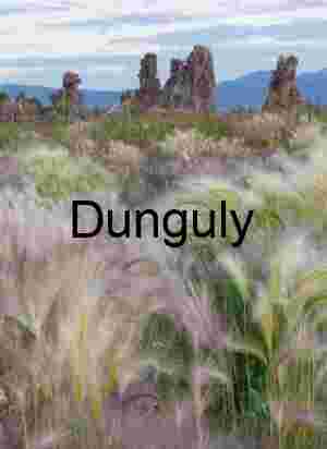 Whispers of Wind and Stone: Tufa Towers Beneath a Mountain Sky