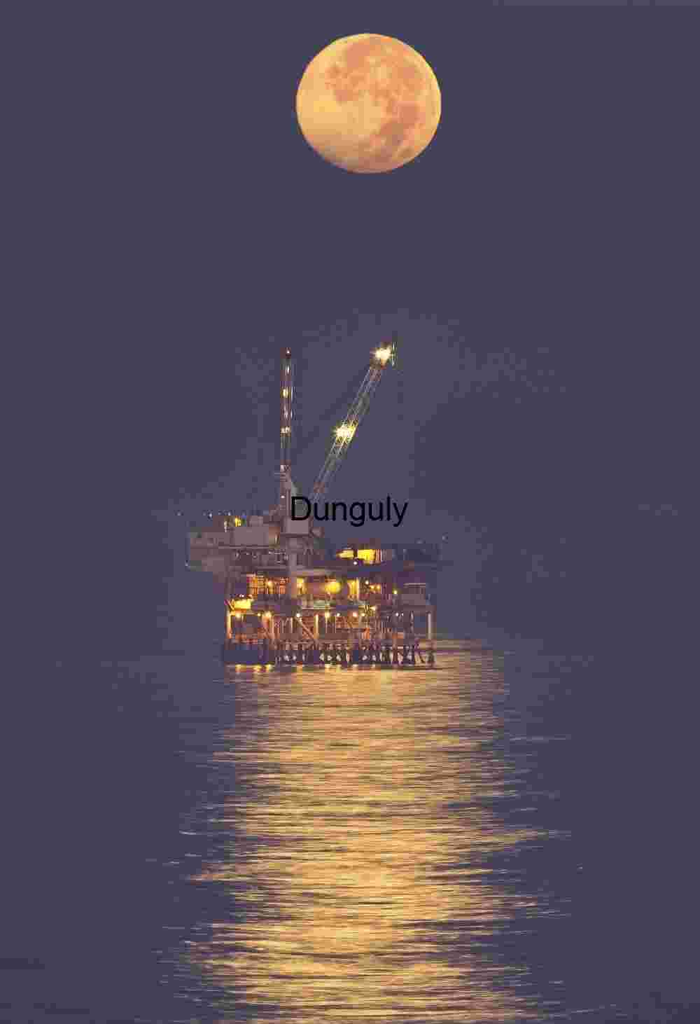 Offshore Oil Rig Under Crescent Moon