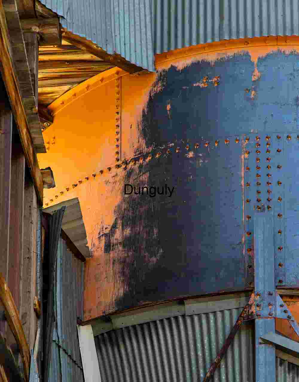 Riveted Silence: Industrial Cylinder in Warm Light