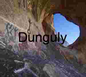 Echoes Through Stone: Petroglyphs Framing Desert Sky