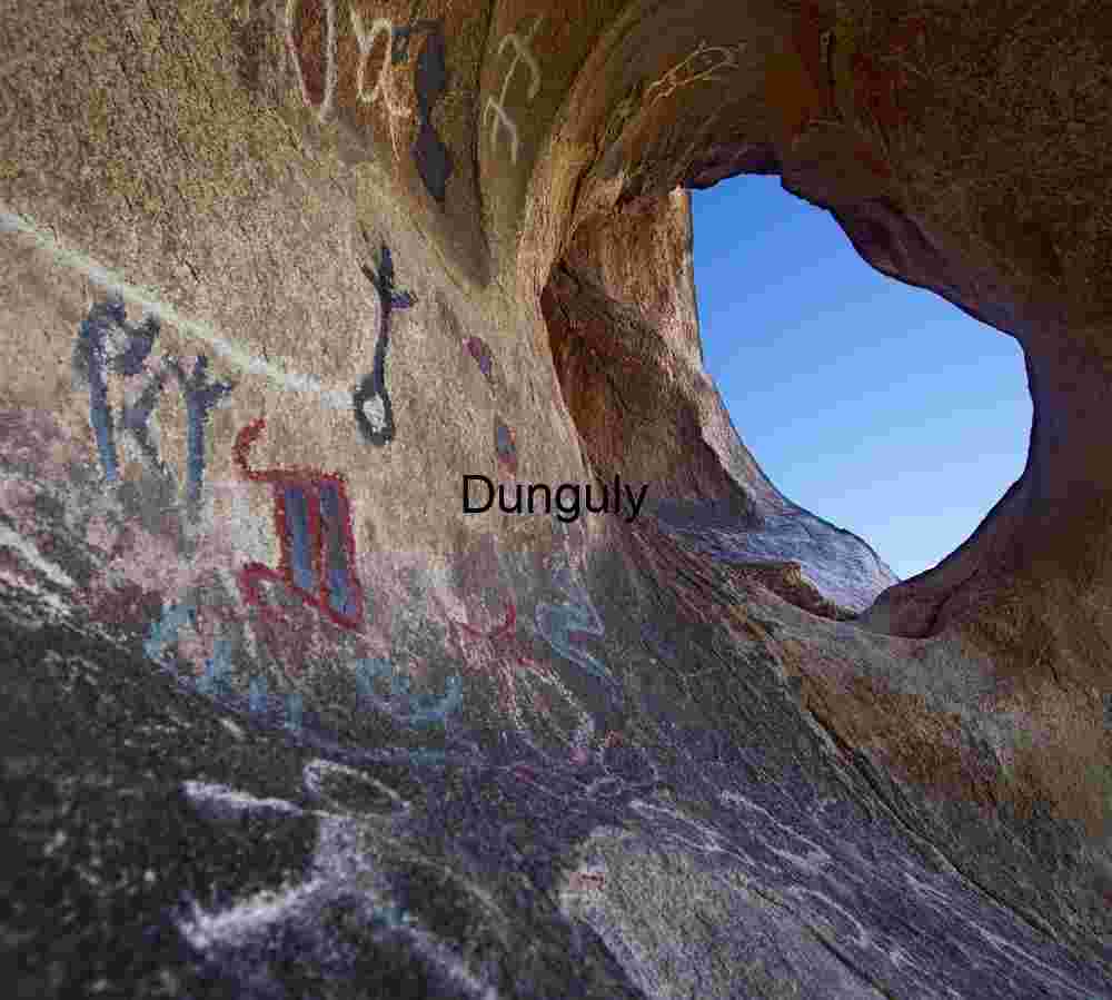 Echoes Through Stone: Petroglyphs Framing Desert Sky