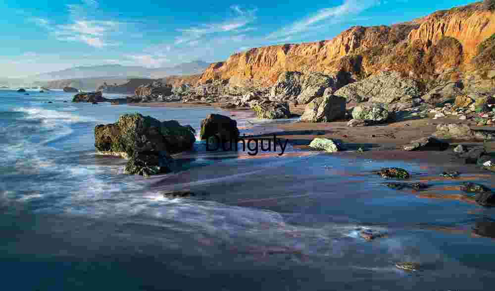 Erosion & Elegance: Rocky Shoreline at Golden Hour