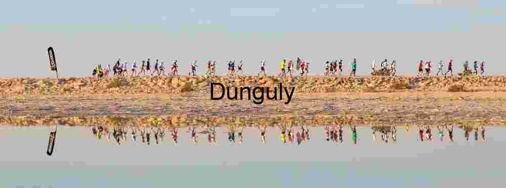 Marathon Runners Casting Long Shadows on Salt Surface