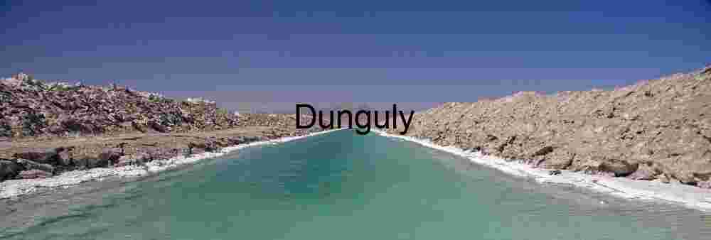 Turquoise Saline Channel Cutting Through Arid Rocky Landscape