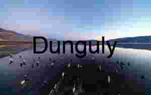 Geometric Lines of Submerged Pier Against Mountain Backdrop