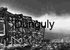 Weathered Wooden Framework in Open Landscape – Industrial Ruin Meets Nature