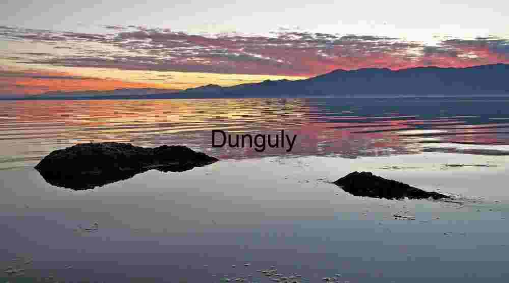 Golden Hour Reflections on a Tranquil Mountain Lake