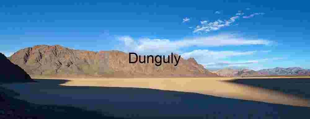 Dramatic contrast between textured cracked earth and a storm-heavy sky, highlighting geological patterns