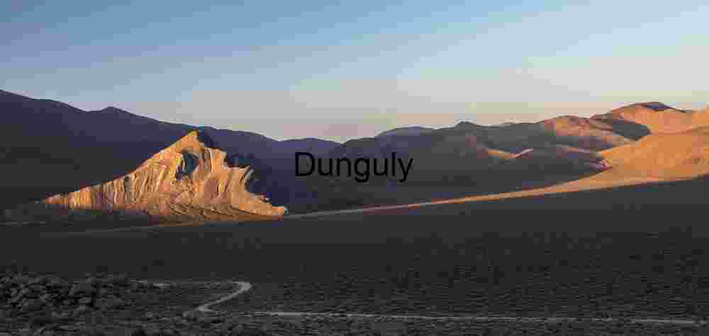 Path to the Peaks: Sunlit Ridges in Desert Silence