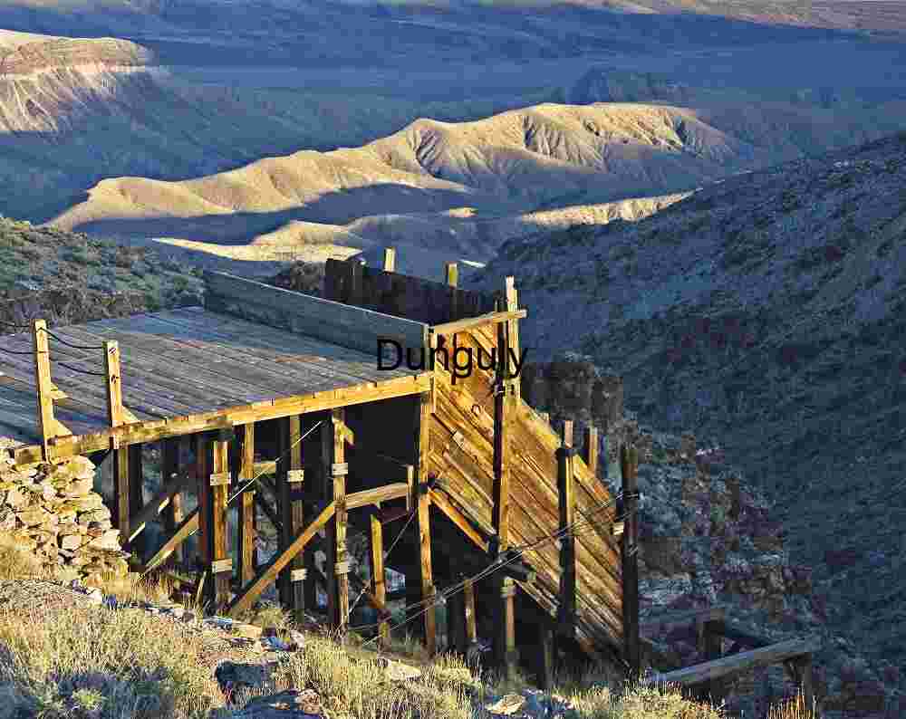 Path to the Peaks: Sunlit Ridges in Desert Silence