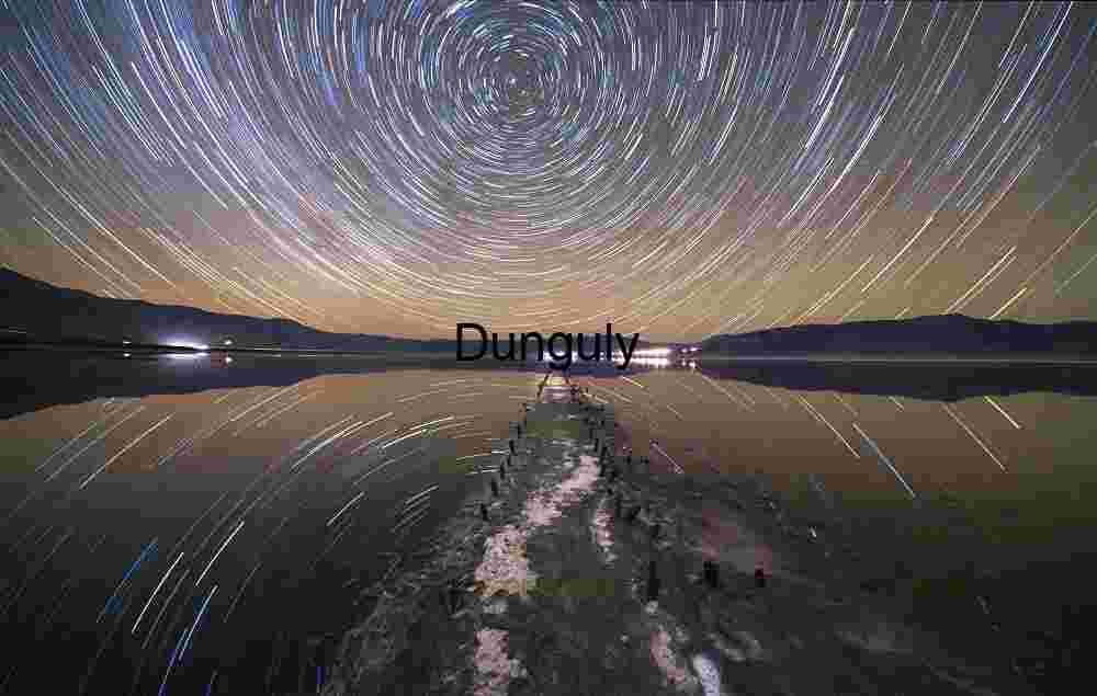 Star Trails over Lake with Jetty – Long Exposure Night Sky Photography