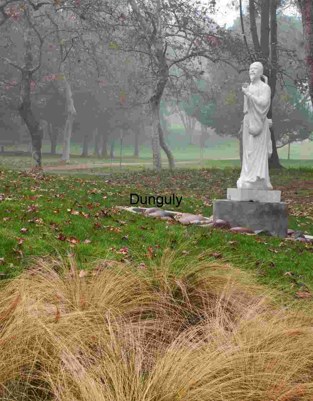 Traditional Bearded Figure in Outdoor Sculpture