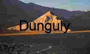 Tilted Earth: Striated Peak Rising from the Desert Floor