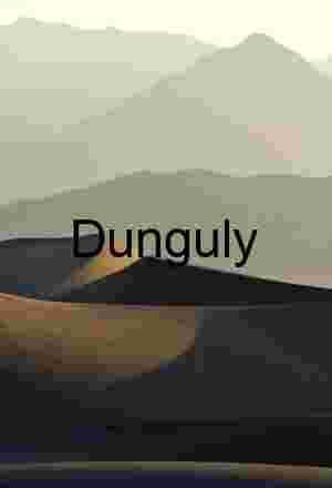 Contours of Silence: Sunlit Dunes Beneath Hazy Peaks