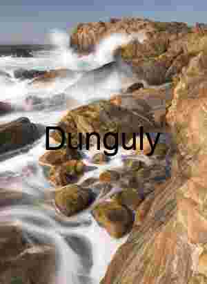 Crashing Waves Over Weathered Coastal Rocks