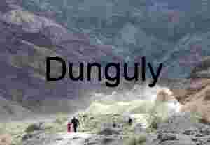 Trail Through Time: Hikers in a Painted Desert Canyon