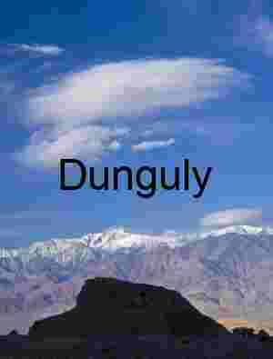 Stone and Snow: Alpine Contrast Beneath a Painted Sky