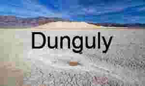 Salt Memory: Cracked Earth and Dunes Beneath a Blue Horizon