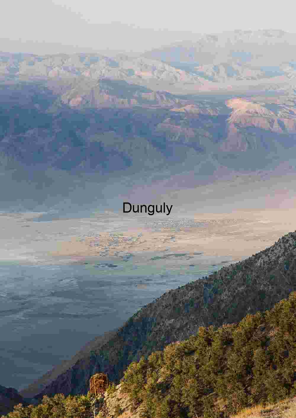 Expansive Desert Valley with Layered Mountain Ranges