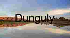 Desert Reflection at Sunset – Jagged Rocks and Tranquil Waters