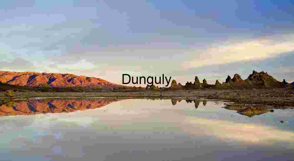 Desert Reflection at Sunset – Jagged Rocks and Tranquil Waters