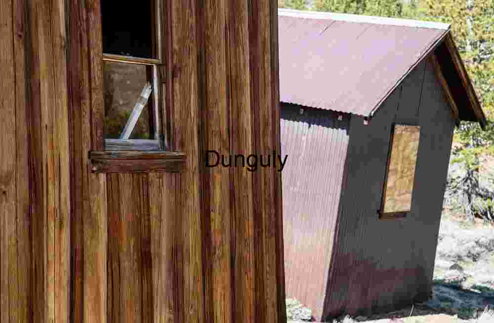 Forgotten Shelter: Wooden and Metal Structures in Rural Decay