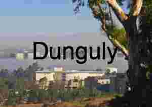 City Skyline Emerging Through Morning Fog