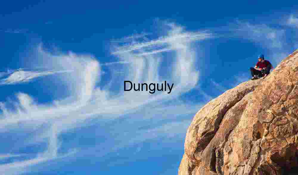 Edge of Sky: Solitary Climber Beneath Streaking Clouds