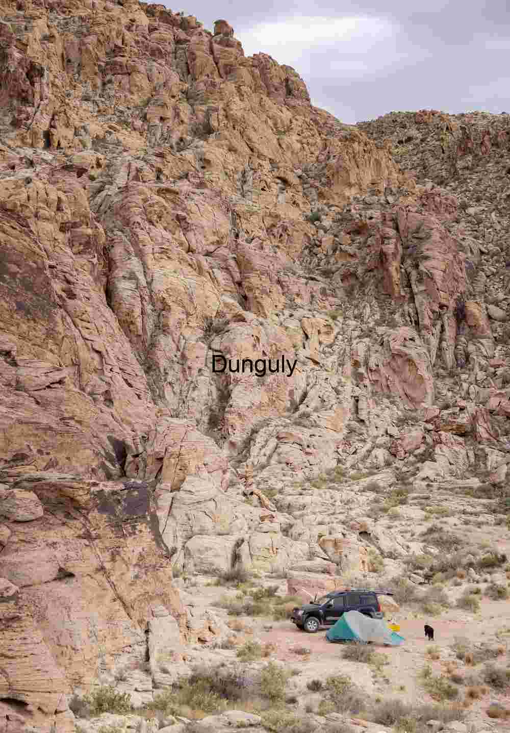 Glowing Sandstone Pocket: Desert Rock Canyon Warmth | Campsite by sandstone cliffs