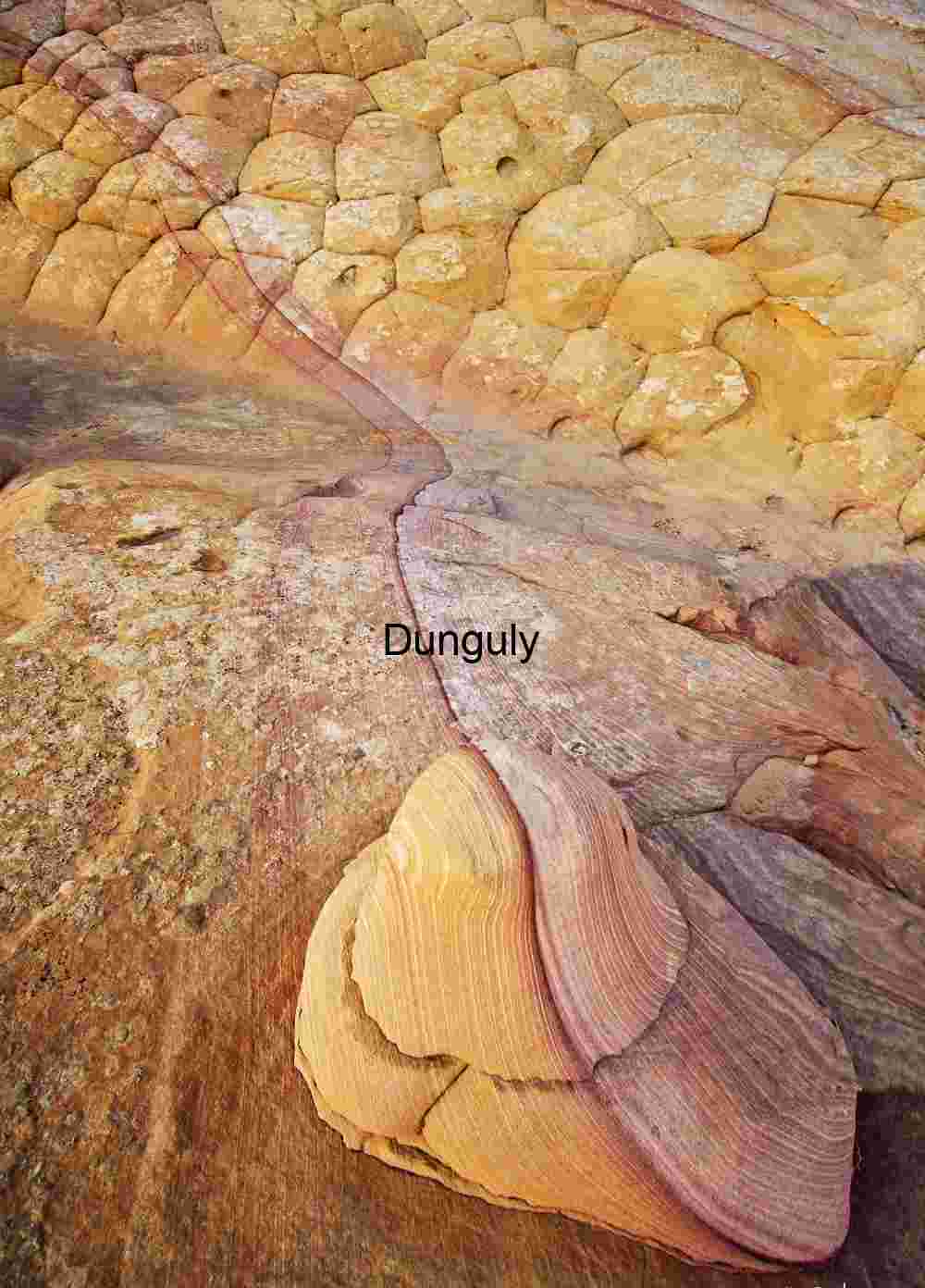 Candy striped boulder; Cottonwood Cove, South Coyote Buttes