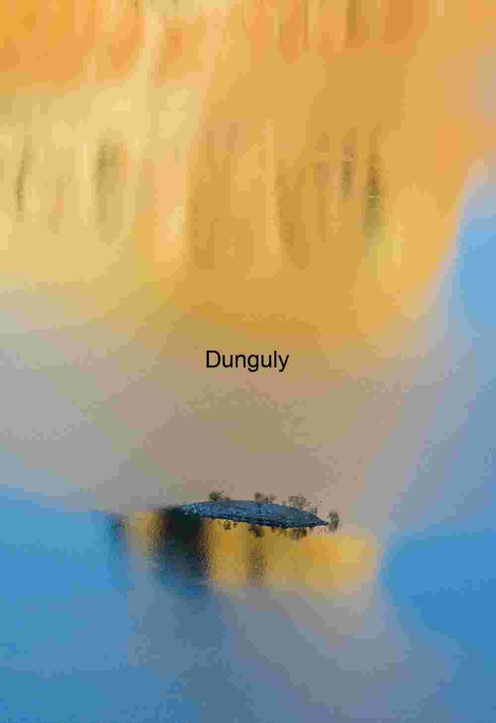 Abstract Reflection of Island in Gold and Blue Water