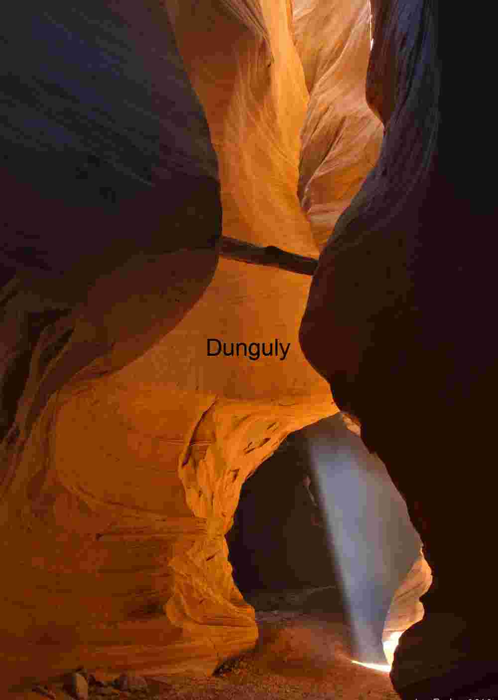 Light shaft and jammed log, Narrows of Happy Canyon, Orange Cliffs, Glen Canyon N.R.A.