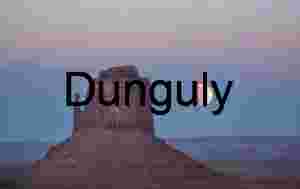 Partially-eclipsed moon rising by East Mitten