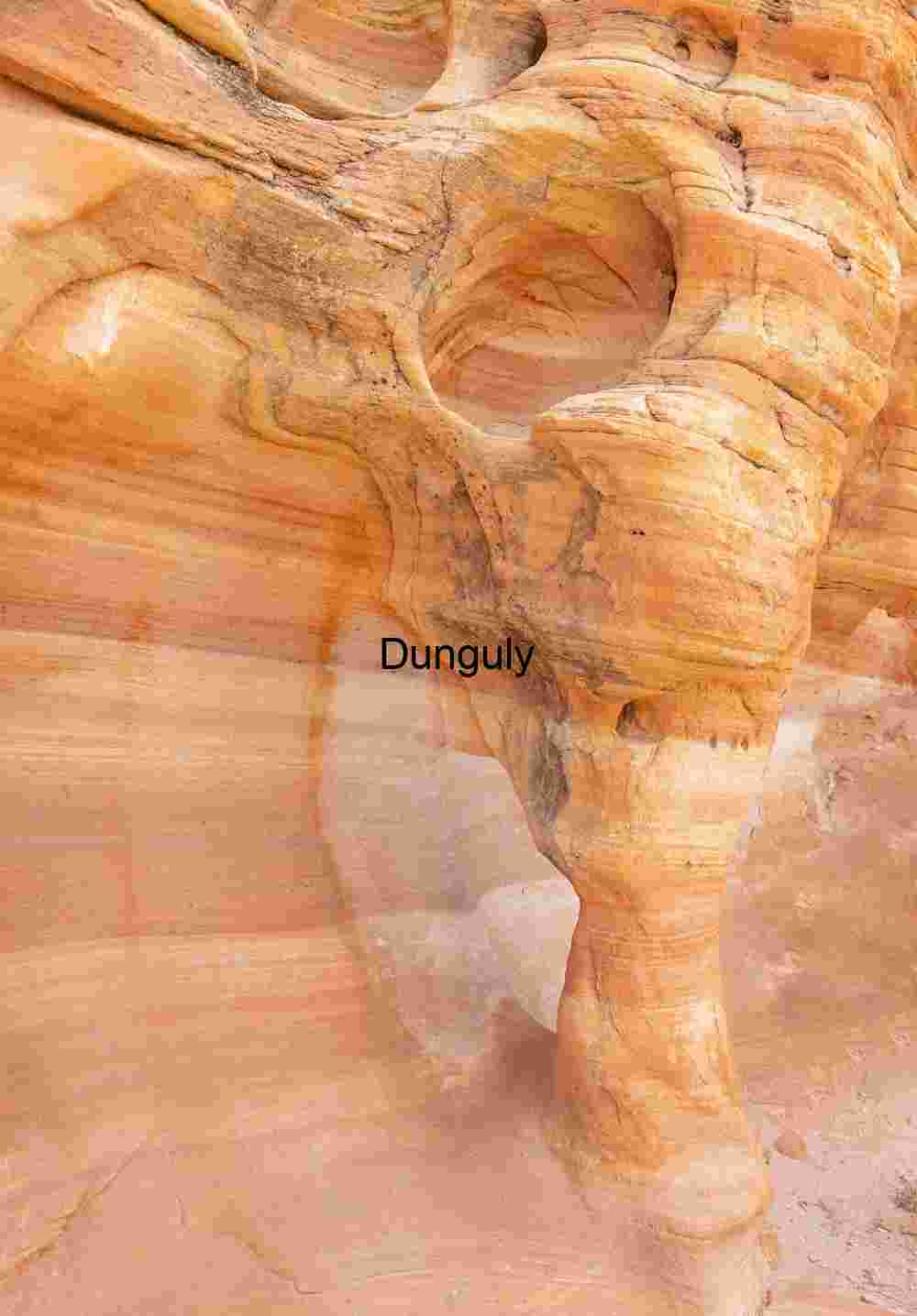 Ancient Sandstone Rock Erosion: Nature's Pocketed Art