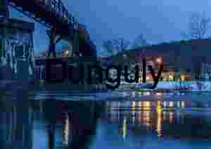 Riverside view of Ohiopyle on a snowy evening; GAP trail