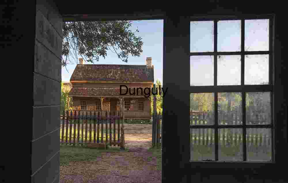 Russell Home framed through doorway of Louisa Marie Russell Home