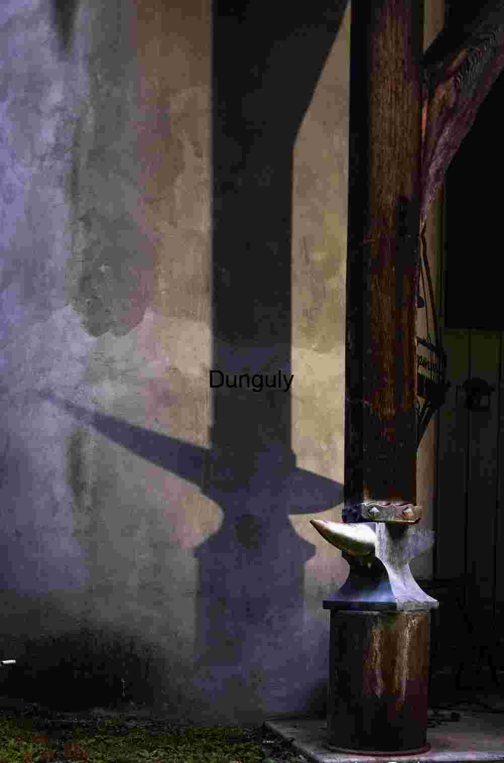 Anvil Shadow on Concrete Wall | Blacksmith Shop Mood