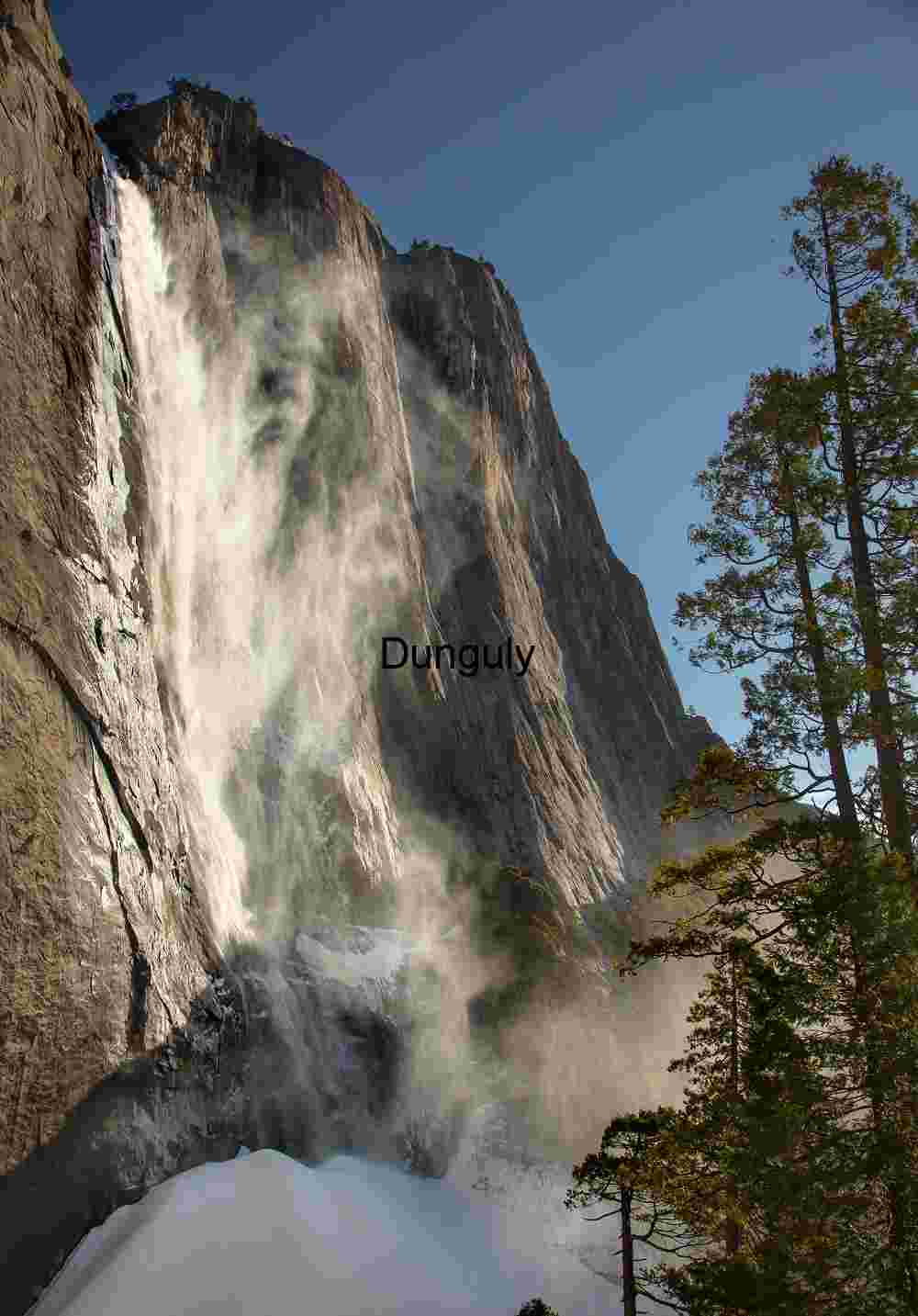 Dramatic Sidelight on Upper Yosemite Fall and Granite Wall