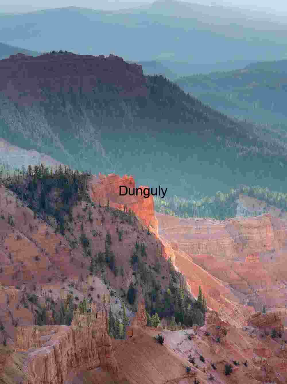 Spotlight on a red bluff, Cedar Breaks N.M.